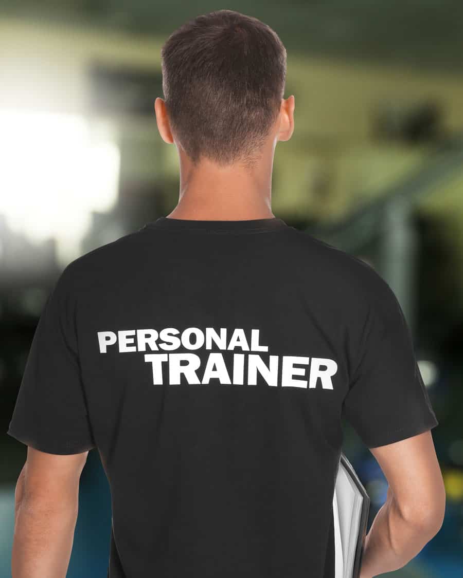 Image Showing Male Personal Trainer From Behind