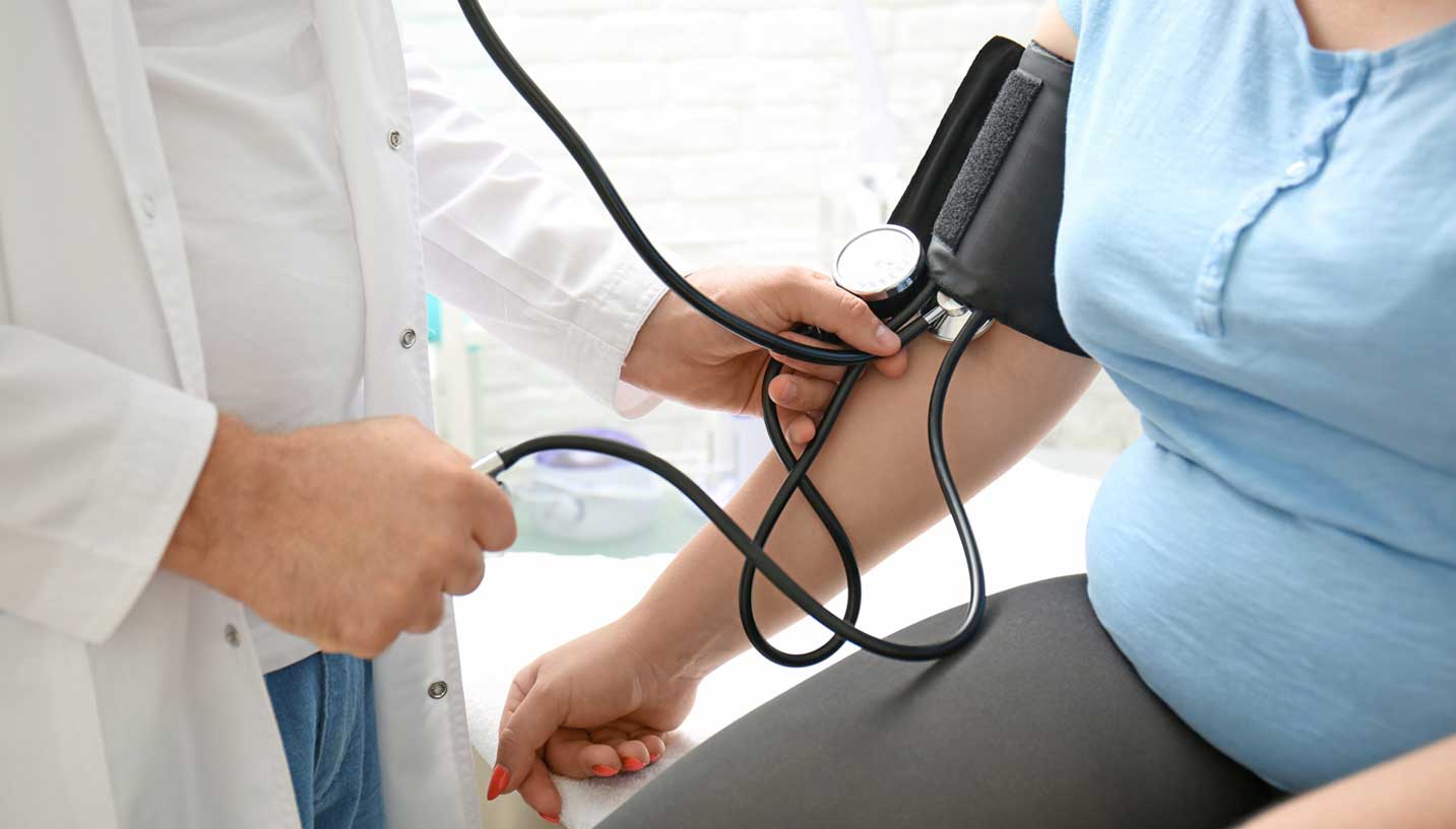 Image Showing Obese Female Blood Pressure Measurement